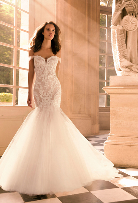 bride wearing elysee margaux in marble foyer