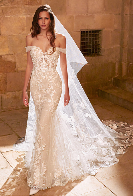 evangeline-dress-style-4 bride wearing veil with elysee evangeline wedding gown