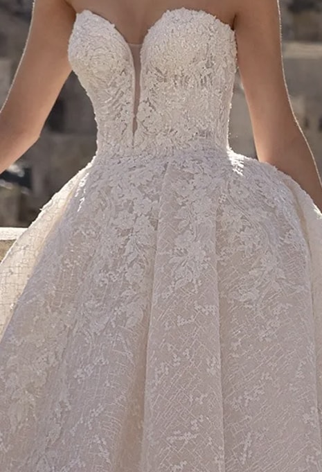 neckline and details on Nicole Romance RO12155 wedding gown