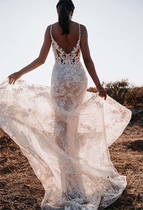allure-bridals-9901-back back of Allure Bridals sheath dress style 9901 train blowing in the wind