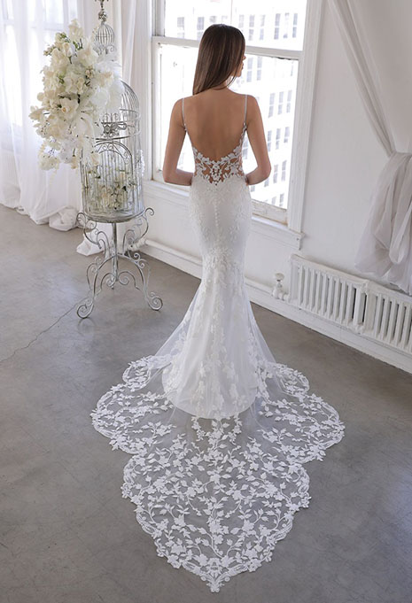 bride modeling back of oliviana dress