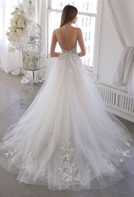 blue-omarra-dress-image-3 bride modeling back of blue by enzoani omarra dress