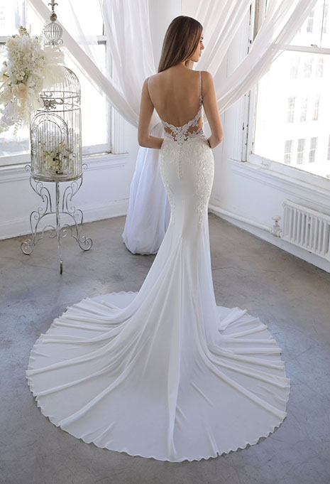 blue-ornina-dress-image-2 bride modeling back of ornina style wedding gown