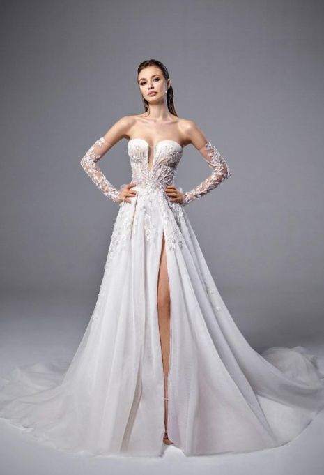 full view of woman wearing the olympia sposa 11hz wedding dress