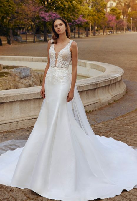 front view of woman wearing the olympia sposa ss517 wedding dress