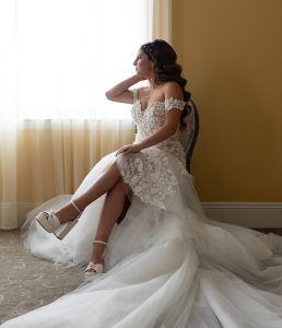 side view of natalie wearing her wedding gown