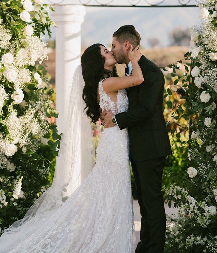 karoza bride natalie kissing her husband