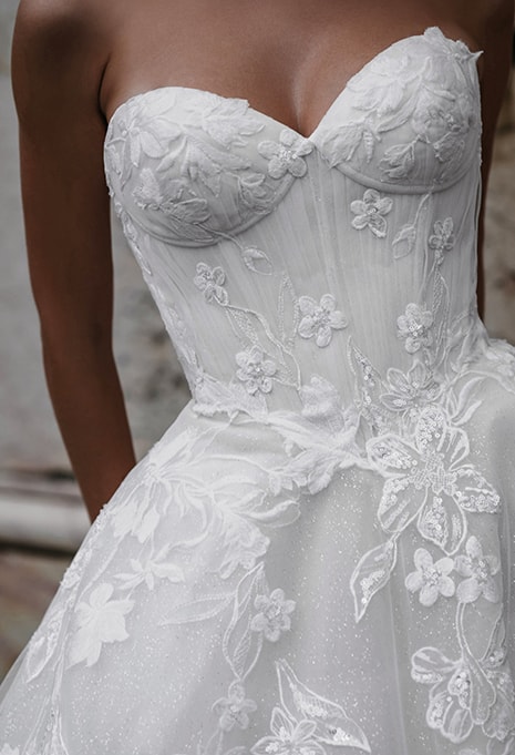 close-up of the lace fabric on the Allure Bridals Babetta wedding gown