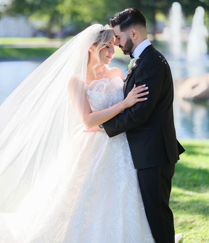 bride and groom smiling on their wedding day