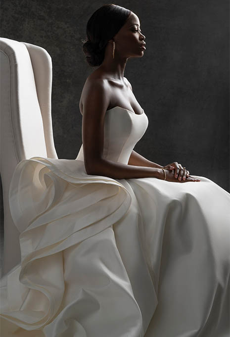 bride wearing Allure Bridals C752 wedding gown sitting down