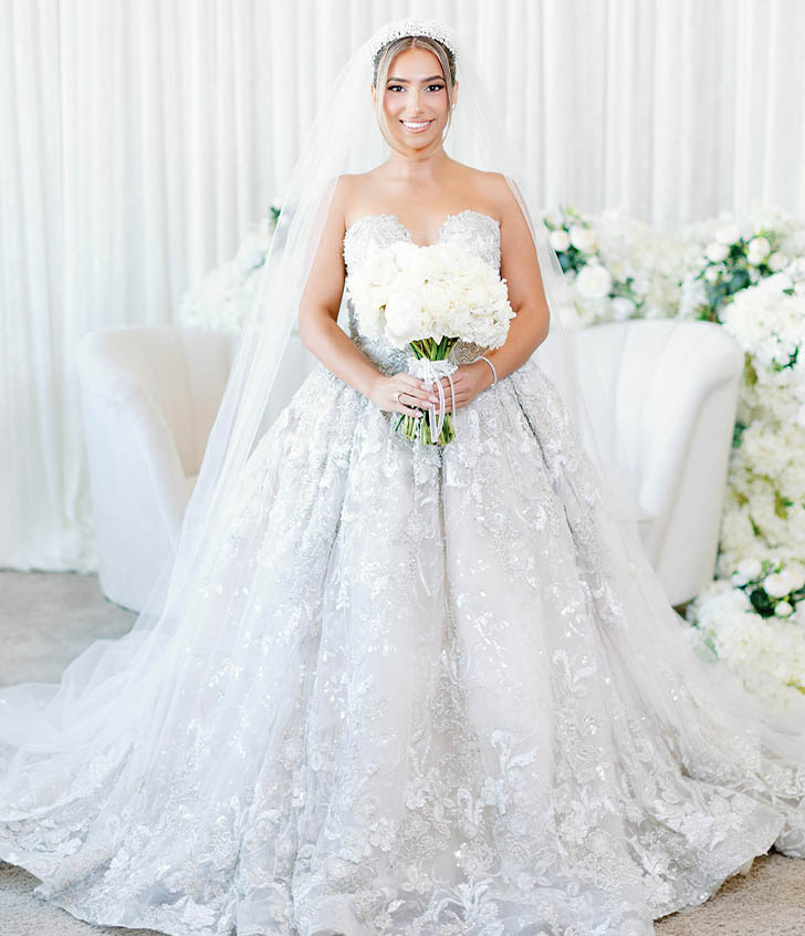 Bianca smiling in her wedding dress