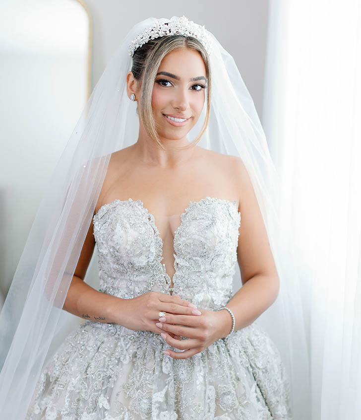 front view of Bianca in her wedding gown