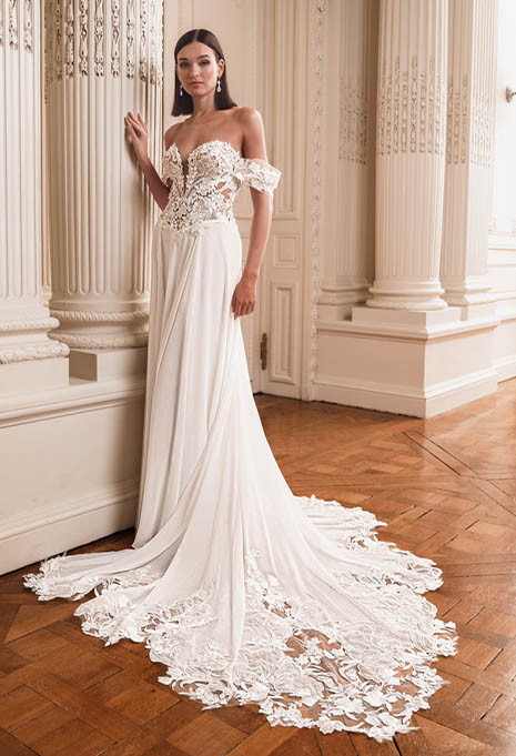 bride posing in Élysée Firouze wedding gown