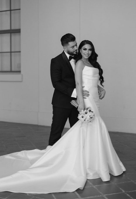 mary and her husband smiling for portrait
