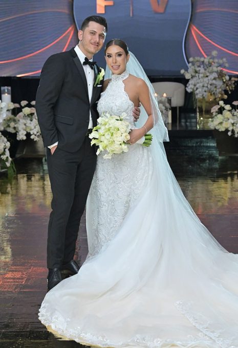bride and groom smiling for portrait