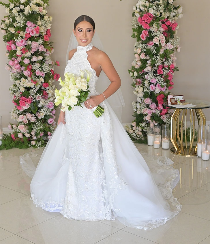 bride smiling for portrait on her wedding day