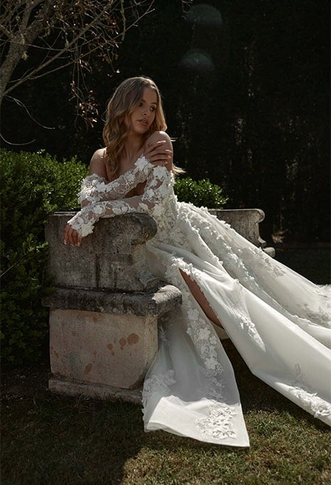 bride posing in Blanche Bridal Clementine wedding gown