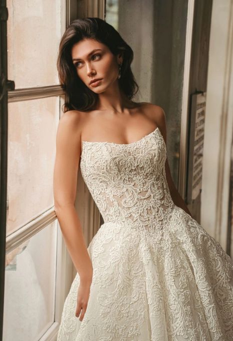 Model wearing the Enzoani West gown up close from the front